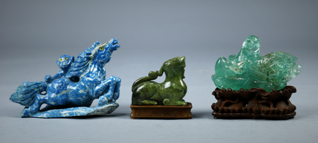 (lot of 3) Assorted Chinese stone carvings: first, a fluorite duck and fish on a wood stand; second,