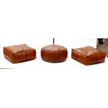 (lot of 3) Leather ottoman group, two of square form, one of circular form, all with brown leather