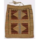 Antique Nez Perce corn husk and dyed yarn flat bag, accented with polchrome geometric design work in