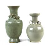 (lot of 2) Chinese glazed porcelains, consisting of one Ding-type vase, the globular body with strap