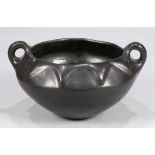 Large Santa Clara blackware bowl, early 20th Century, the slightly compressed bulbous form flanked