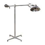 Large Industrial Age chrome movie light, circa 1940, having an adjustable counter balanced arm