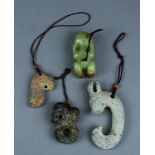 (lot of 4) Chinese archaistic hardstone carvings: including a pig-dragon and an anthromorphic figure