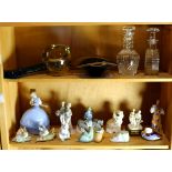 Two shelves of Continental and English assorted glass and porcelain decorative table top items,