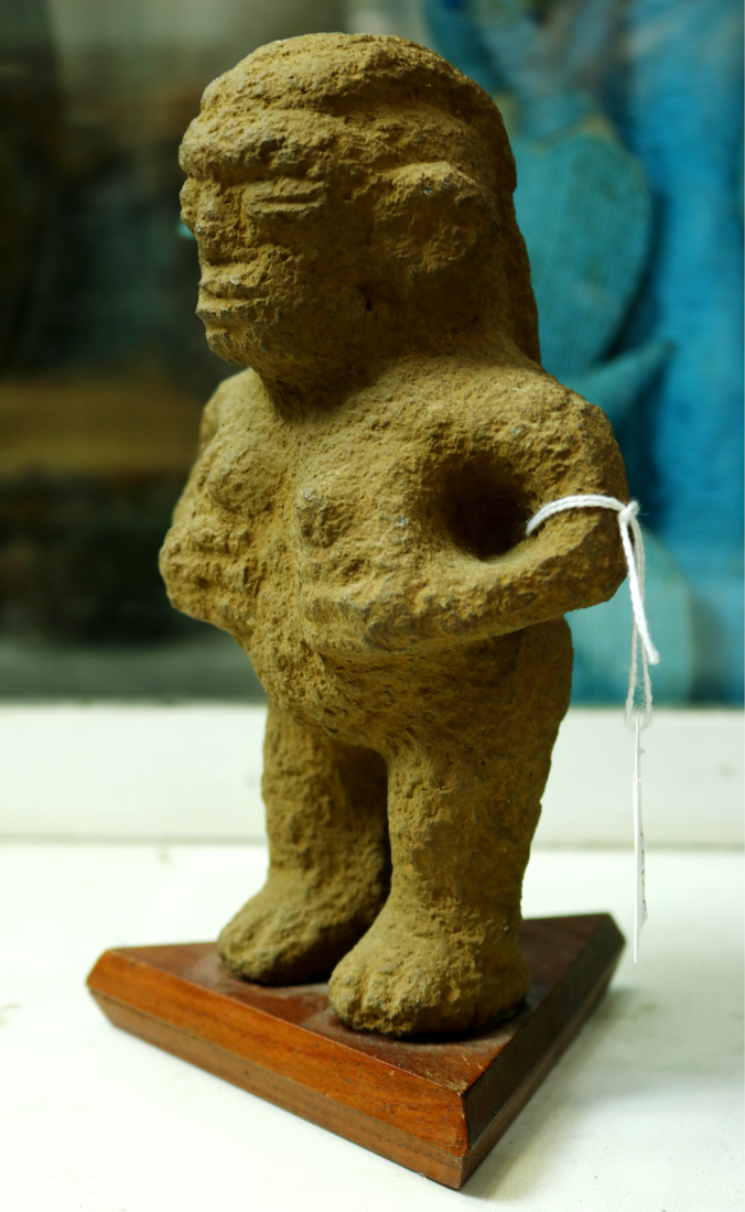 Pre-Columbian standing female stone figure, hands below her breasts, long striated hair down her - Image 2 of 2