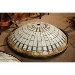 Arts and Crafts style leaded glass pendant lamp, having a dome form with carmel, cream and green