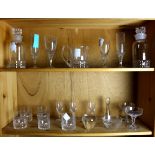 Two shelves of Scandinavian crystal and glass, including champagne flutes, wine glasses, (2)
