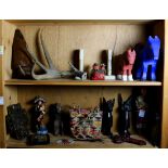Two shelves of assorted decoratives, including a single antler, (2) polychrome carved horses, 9.5"h;