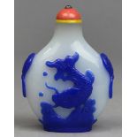 Chinese blue overlay white glass snuff bottle, 19th/early 20th century, both sides featuring a