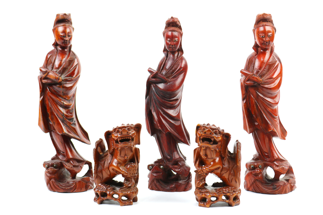 (lot of 5) Chinese wood carvings: consisting of a pair of fu-lions; together with three female