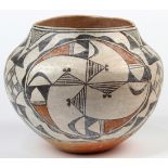 Acoma pottery olla or water jar, having a shouldered form with a geometric paint decorated exterior,
