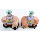 Pair of Chinese enameled porcelain vases, each of the caparisoned elephants supporting a gu form