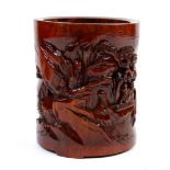 Chinese bamboo brush pot, carved with a scholar playing a qin under a pine on a pierced ground,