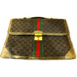 Vintage Gucci style briefcase, the exterior featuring an all over "Gucci double G" pattern and the