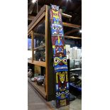 Pennsylvania amusement park metal totem pole sign, 1930-1950, the metal sign painted red, white,