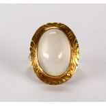 Cat's eye moonstone and 14k yellow gold ring Featuring (1) cat's eye moonstone, measuring