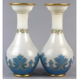 Pair of Bohemian glass vases, early 20th Century, the milk glass vase with polychrome and gilt