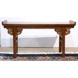 Chinese wooden narrow table (qiaotou tiao'an), the single panel top with upturned flanges at the