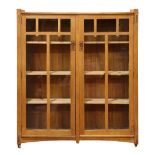 Arts and Crafts Stickley Brothers two door bookcase, having thru tenon construction with original