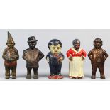 (lot of 5) Cast iron figural still/penny banks, consisting of an "Aunt Jemima" example, having