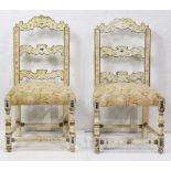 Pair of Continental polychrome decorated chairs, each having a shaped crest with figural decoration,