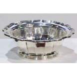 Frank W. Smith Silver Co. sterling silver serving bowl, having a sculpted rim and rising on a foot
