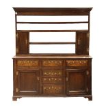 Welsh cupboard circa 1780, executed in oak, having a tiered superstructure above the six drawer case