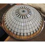 Arts and Crafts style leaded glass pendant lamp, having a dome form with carmel, cream and green