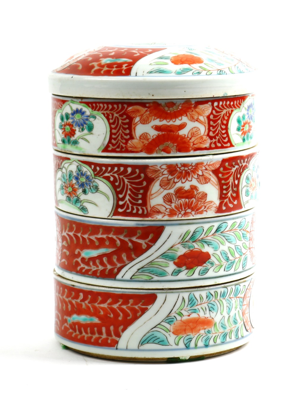 Japanese Imari four-tier food container decorated with various floral images in reserves, approx.