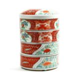 Japanese Imari four-tier food container decorated with various floral images in reserves, approx.