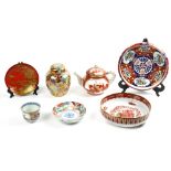 (lot of 7) Group of Japanese ceramics: consisting of one Imari dish and cup; one Kutani tea jar; a