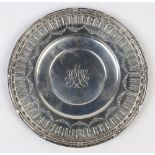 Gorham Manufacturing Co. sterling silver charger, the ornately decorated rim with a continuous