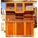 Custom American studio sideboard, executed in highly figured cherry, having three doors with glass