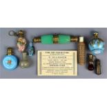 (lot of 9) Assorted glass and gilt metal mounted miniature perfume bottles, comprising a spherical