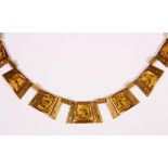 Peruvian 14k yellow gold necklace Composed of (7) graduating articulating plate links, each