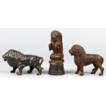 (lot of 3) Cast iron still lion penny banks, each modeled with a fluffy mane, one depicted as
