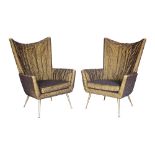 Pair of Italian Modern club chairs in the manner of Gio Ponti, circa 1950, each having a wing back