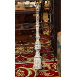 French cast iron newel post, circa 1890, having a fluted standard and rising on an octagonal base,