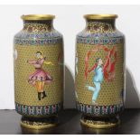 Pair of Chinese cloisonne enameled vases, the rouleau body featuring various beauties at dance on