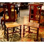 Pair of Queen Anne style rush seat side chairs, the curved crest rail with out-swept ears over a