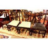 (lot of 4) Associated Chippendale side chairs, each with an upholstered seat and rising on