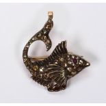 Diamond and silver-topped, 10k yellow gold fish brooch-pendant Designed as a mythical fish,