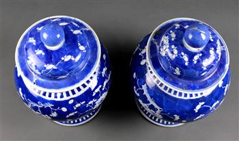 Pair of Chinese underglaze blue porcelain lidded jars, featuring prunus on a cracked-ice ground - Image 3 of 4