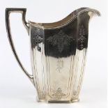 Reed & Barton sterling silver water pitcher, decorated with foliate motifs framing the "P" monogram,