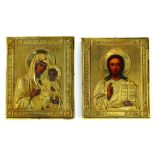 (lot of 2) Russian icon wedding pair, each having a brass oklad, one depicting Christ Pantocrater,