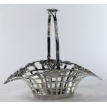 Harris and Schafer Co. sterling silver swing handle basket, having an outswept rim with relief