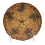 Southwest Native American Apache coiled basket, with animal and human motifs flanked by five diamond