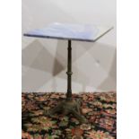 French bistro table, having a square marble top, above a gueridon cast iron base, 29"h x 22"square.;