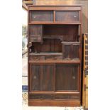 Japanese kazaridana chest: sliding door section above the display shelf, left with a hinged door and
