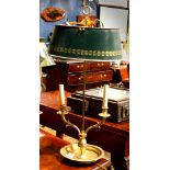 Louis XV style bouillotte table lamp, with a tole green shade, having two arms, 28.5"